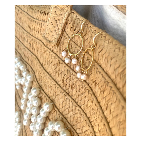 Gold hoops with three pearl drops