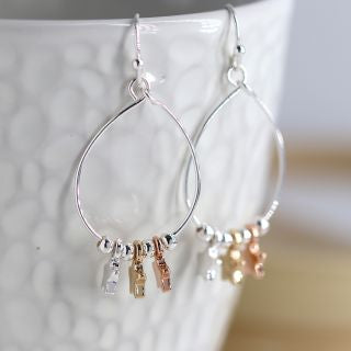 Silver hoops with stars