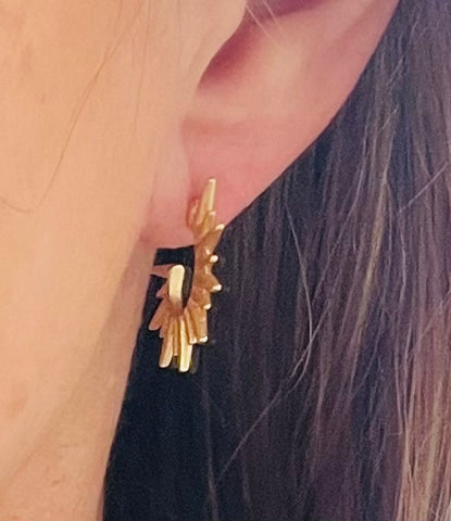 Gold sun burst earrings