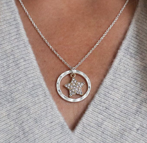 Silver circle and star necklace