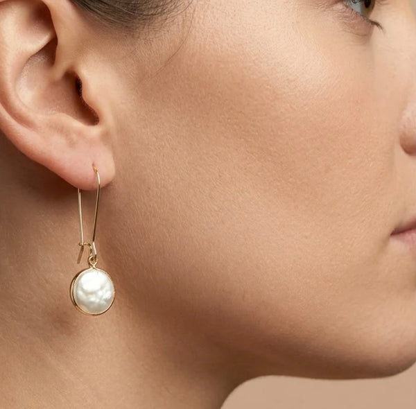 Pearl long drop earrings