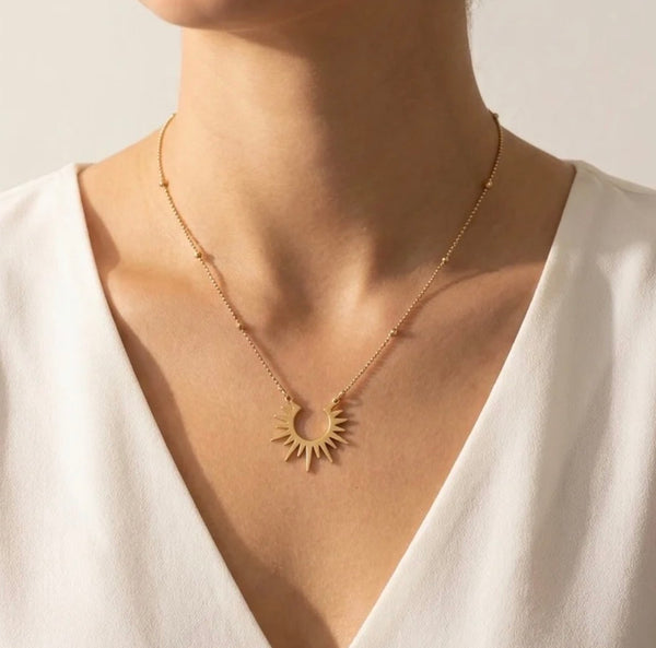 Matt gold sun burst necklace