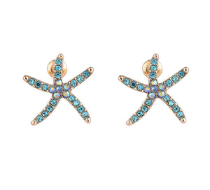 Blue diamanté star fish  stud
