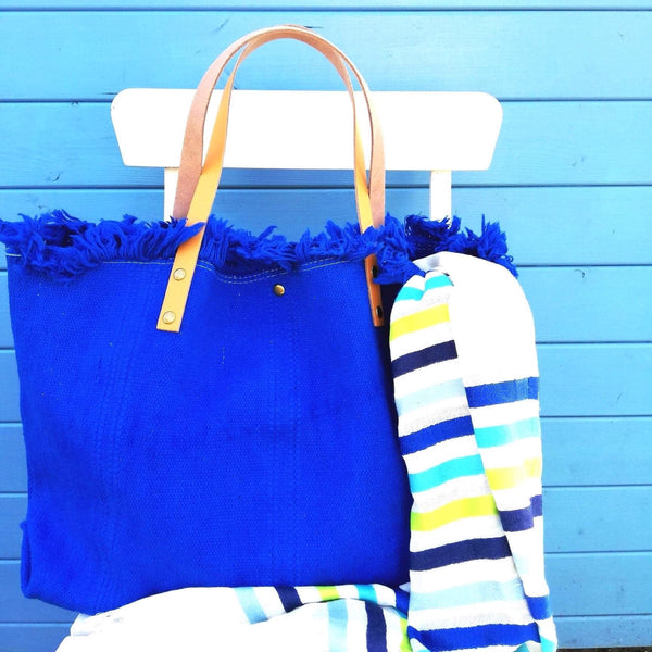 Blue canvas summer bag with leather handles